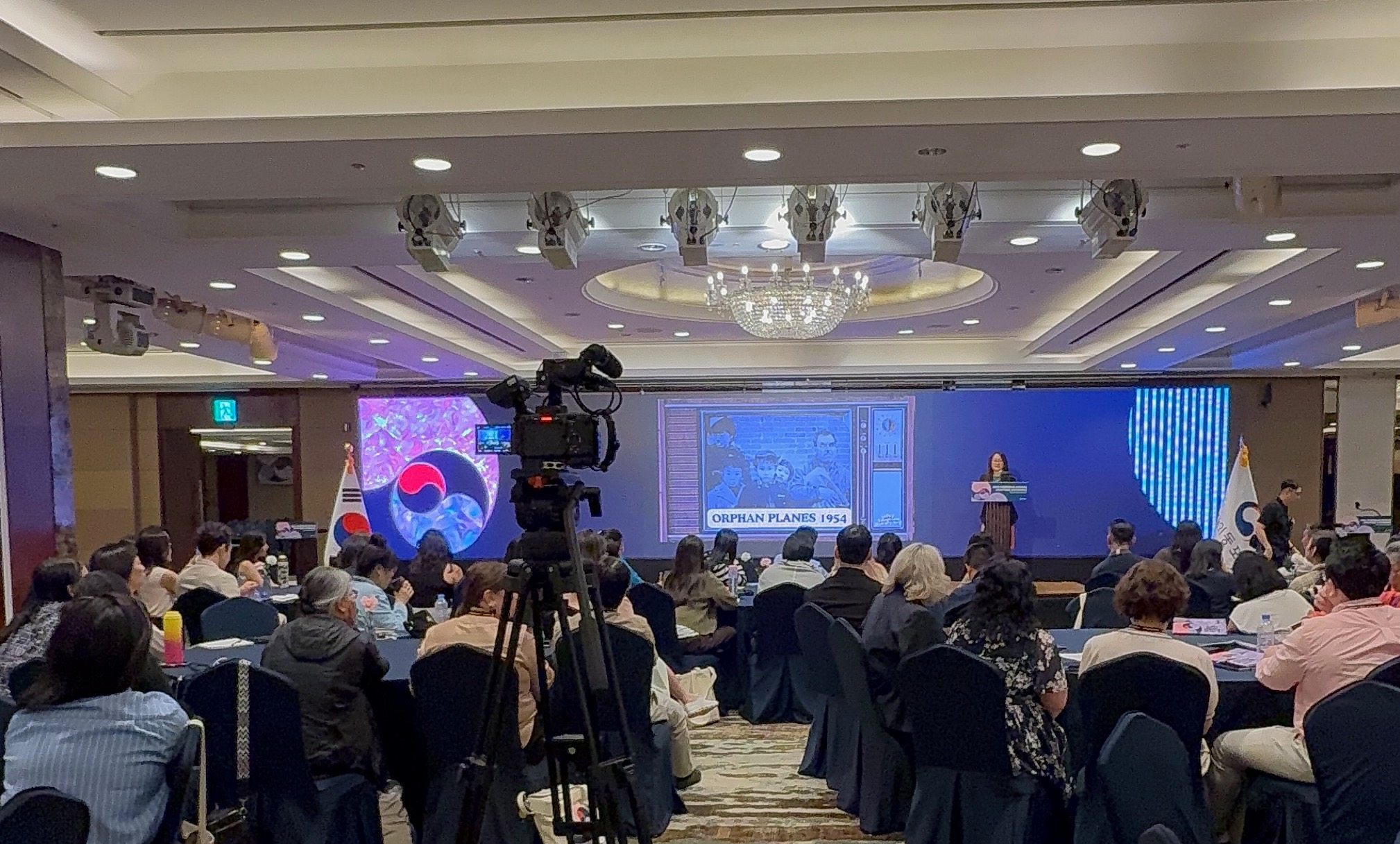 International Author, Janine Myung Ja presenting at the 2026 OKA conference on the history of global adoption.